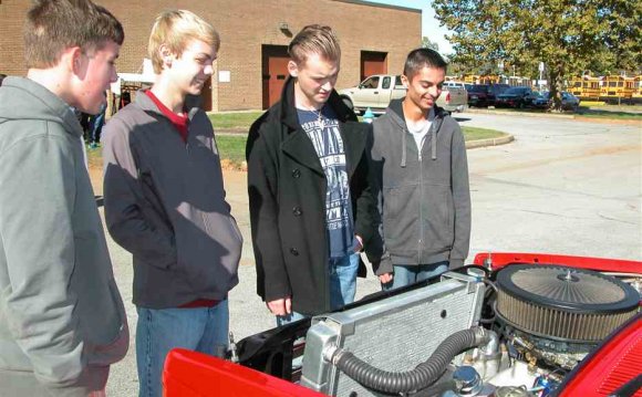 Students in auto mechanics